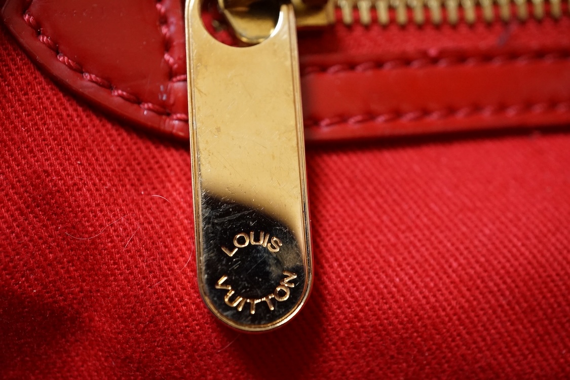 A Louis Vuitton Salina ruby monogram tote bag, numbered RC4077, with dust cover, 44cm wide
